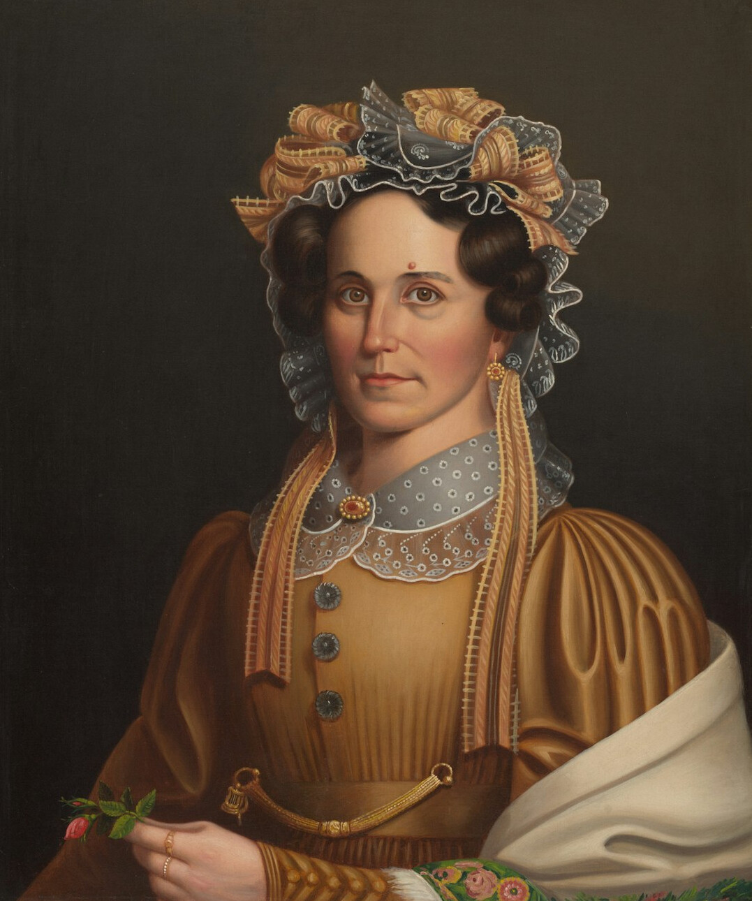 Studio portrait of a Latin American woman in her thirties, historian