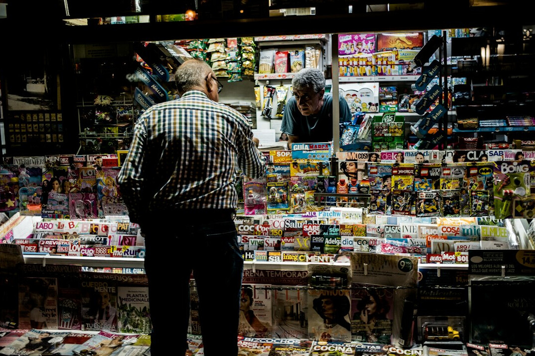 store detective observing shoppers